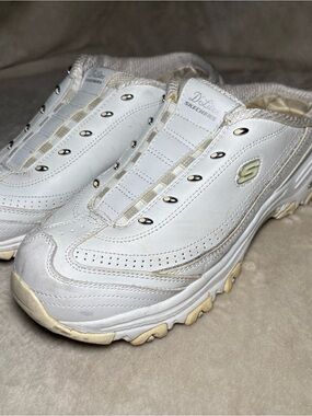 White Skechers D'lites slip-on sneakers